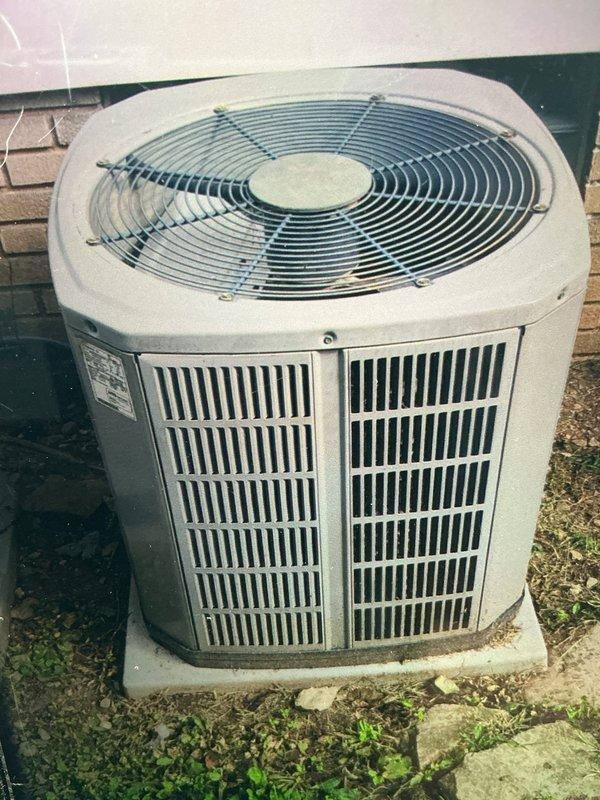Completed routine maintenance on 10-year-old residential air conditioning system. Inspected outdoor condenser unit and indoor control board, verified all electrical connections and components are secure and functioning properly, and documented system condition with photographs for service records.