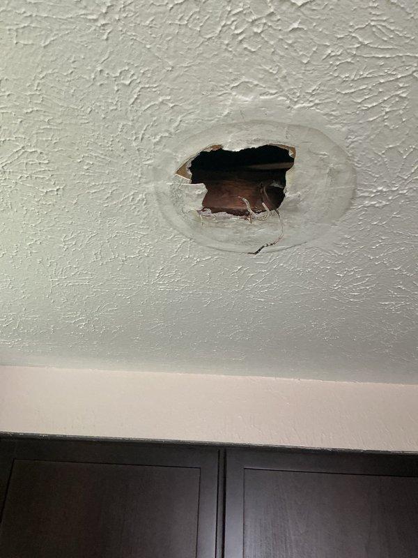 Responded to service call for exposed wiring and damaged ceiling where light fixture had been removed. Secured loose electrical wires, installed proper wire connectors, and verified all connections were safely contained within junction box. Coordinated with customer regarding ceiling repair needs around fixture opening to restore proper finish and ensure safe installation of replacement lighting.