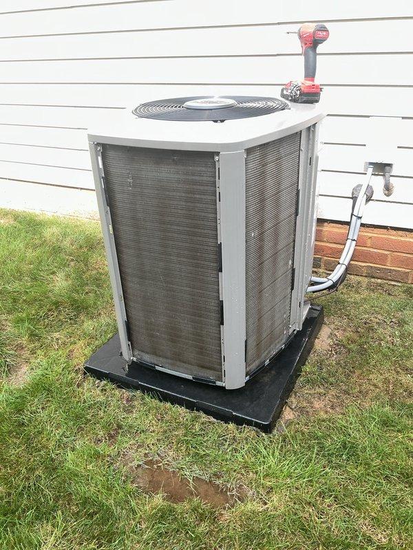 Completed preventive maintenance cooling visit on 21-year-old residential air conditioning system with outdoor condenser unit and basement air handler. Performed comprehensive system inspection including refrigerant pressure and temperature diagnostics using manifold gauges and digital testing equipment to verify proper operating pressures and superheat/subcooling values. Inspected outdoor condenser unit including coil condition, fan operation, electrical connections at disconnect box, and refrigerant line insulation integrity. All components found operating within normal parameters for system age, with no immediate service needs identified at this time.