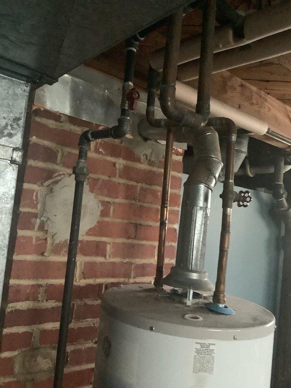Provided comprehensive estimate for complete HVAC system replacement of aging equipment including a 1983 gravity furnace and 2001 air conditioning unit. Assessed existing basement installation with outdated gravity heating system, evaluated current ductwork configuration, refrigerant line routing, gas piping, and electrical connections to determine scope of replacement work required for modern forced-air system upgrade.