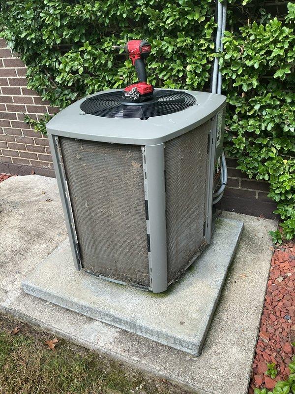 Completed preventive maintenance cooling visit on 7-year-old residential air conditioning system. Performed comprehensive inspection of outdoor condenser unit, including visual assessment of cabinet condition, protective grilles, and fan assembly. Unit found to be in serviceable condition with normal signs of outdoor exposure. All components accessible and operational during routine maintenance procedures.