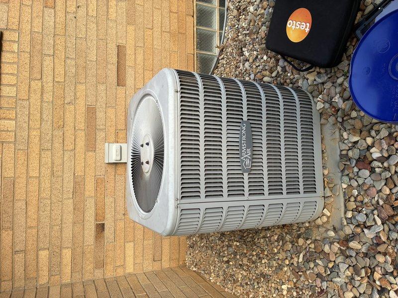 Performed routine AC tune-up on 5-year-old outdoor condensing unit. Conducted electrical diagnostics using clamp meter, verified system amperage readings, and inspected all mechanical components. Unit operating within normal parameters with no issues identified.