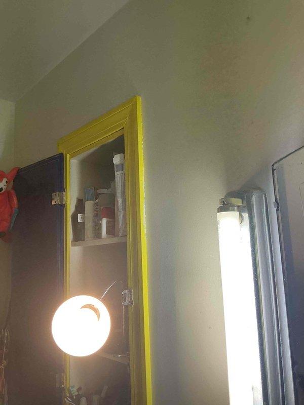 Responded to service call for malfunctioning fluorescent light fixtures in bathroom. Upon inspection, found one side required lamp replacement while the opposite side needed both new lamp and ballast repair. Replaced defective fluorescent tubes on both fixtures and repaired faulty ballast to restore proper operation. All lighting fixtures tested and verified operational upon completion.