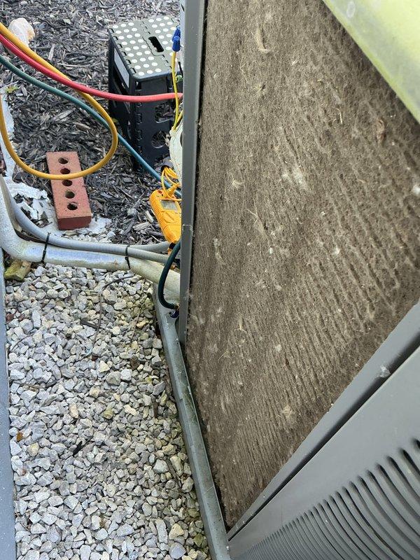 Completed routine AC tune-up on three-year-old system. Replaced heavily soiled air filter at outdoor condenser unit, which showed significant dust and debris accumulation. Addressed excessive condensation on supply duct at indoor air handler, inspected electrical connections and components, and verified system operation. No pre-existing issues reported; all maintenance items completed successfully.