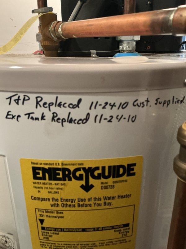 Responded to service call for water heater experiencing a small leak and pinging noise. Upon inspection, identified the source of the leak at the temperature and pressure relief valve and addressed minor sediment accumulation causing the audible pinging. Examined the natural gas water heater unit, which showed previous maintenance records from 2010 including T&P valve and expansion tank replacement. Verified all plumbing connections, tested safety systems, and confirmed proper operation of the heating element and thermostat controls. Documented existing equipment configuration including HVAC system proximity and utility room conditions for future reference.