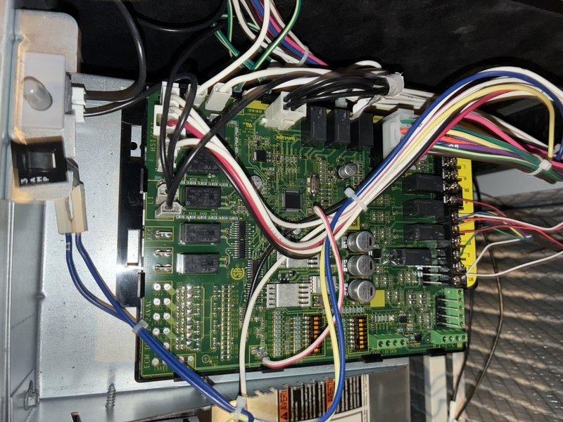 Completed MVP AC maintenance on cooling system. Performed thorough inspection of evaporator coil assembly, noting A-frame configuration with proper fin spacing and secured components with zip ties. Inspected electronic control board and verified all wire harnesses, terminal connections, and circuit board components for proper operation and secure mounting within equipment enclosure.