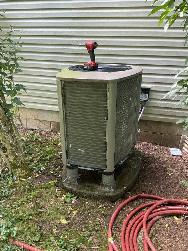 Completed routine MVP cooling maintenance visit on residential air conditioning system. Performed comprehensive inspection of outdoor condenser unit and associated electrical disconnect panel, documenting equipment condition with photographs. Verified proper operation of contactors, relays, and electrical connections within the 440V disconnect box, noting capacitor specifications of 40/5 MFD. All system components found operating within normal parameters with no immediate service needs identified.