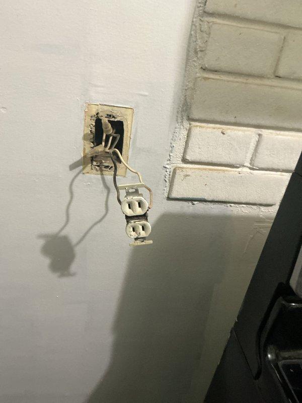 Replaced outdated two-prong electrical outlet with grounded three-prong receptacle in kitchen area to meet current safety standards. Verified proper grounding and secure installation in existing electrical box, restoring safe electrical service to the location.