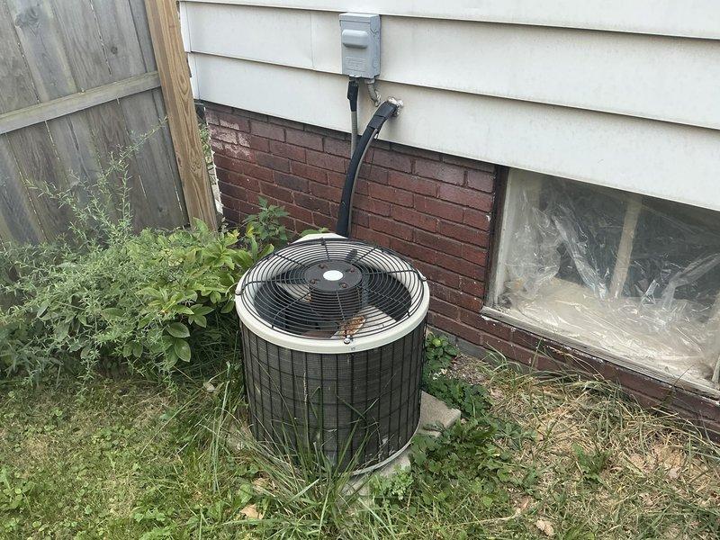 Conducted estimate for complete HVAC system replacement on 20-year-old equipment experiencing no cooling condition. Unit showing significant condensation accumulation on indoor air handler and ductwork indicating system failure, with outdoor condenser unit also requiring replacement due to age and performance issues.