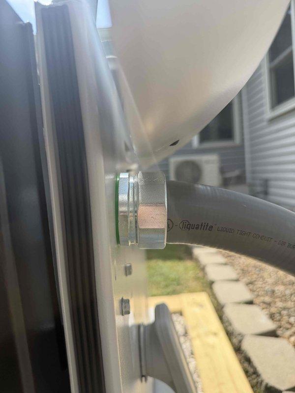 Installed 14 KW Generac generator with 16-circuit transfer switch, including oil warmer installation and 15 feet of electrical line run using liquid-tight conduit. Customer provided gas line connection independently. Completed all electrical connections, junction box wiring, and exterior conduit routing to building soffit, with generator and transfer switch fully operational upon completion.