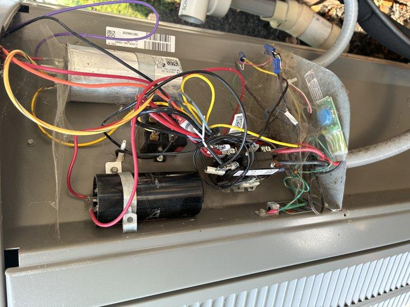 Completed comprehensive AC tune-up including inspection of indoor air handler electrical components, capacitor, and motor assembly. Verified outdoor disconnect box operation, tested electrical connections, and inspected refrigerant line set and condensate drainage system for proper function.