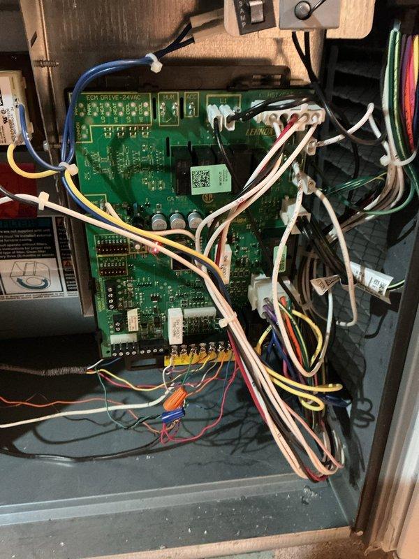 Performed comprehensive preventative maintenance and tune-up on 1-year-old Lennox furnace system located in basement. Conducted thorough inspection of all major components including heat exchanger, blower assembly, and burner operation. Verified proper function of dual-board control system with previous board replacement history from 2022. Checked all electrical connections, wire terminations, and control board interfaces for secure mounting and proper operation. Inspected ductwork connections and PVC venting system for proper installation and clearances. Tested thermostat communication and system cycling. Confirmed furnace operating within manufacturer specifications with no issues detected during service call.