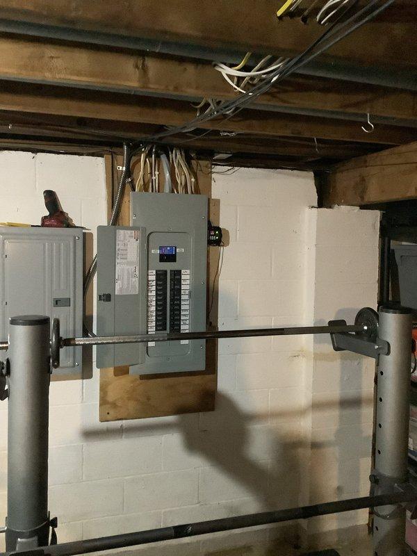 Installed three new dedicated electrical circuits from main panel in basement to kitchen area. Ran 40-amp circuit with appropriate gauge wire to accommodate new cooktop installation. Installed 15-amp circuit for kitchen ventilation system. Added 20-amp circuit to supply two island receptacles in kitchen. All circuits routed through basement joists, properly secured and terminated at panel with correct breakers. Work performed in accordance with NEC requirements for kitchen appliance circuits.