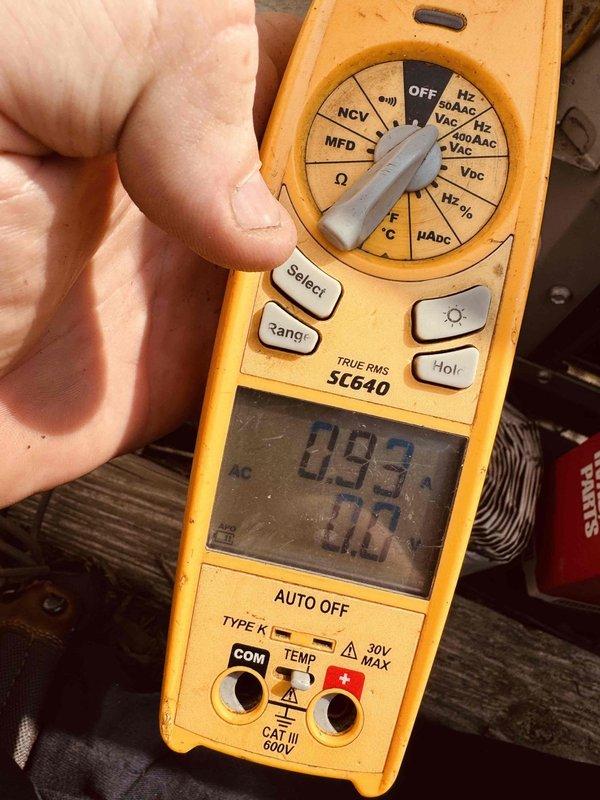 # HVAC Service Report

Responded to no-cooling complaint on 7-year-old residential air conditioning system with reported buzzing noise from outdoor unit. Upon inspection, identified failed dual-run capacitor as root cause of compressor malfunction and abnormal sound. Capacitor tested at 893 microfarads, significantly outside manufacturer specifications of 30 microfarads indicated on component label. Removed defective capacitor showing visible signs of age deterioration, corrosion on terminals, and compromised mounting hardware. Installed new OEM-equivalent dual-run capacitor with proper ratings for compressor and condenser fan motor. Verified electrical connections, secured all wiring, and tested system operation. Unit now cooling properly with normal amperage draw and no abnormal sounds. System returned to full operational status.