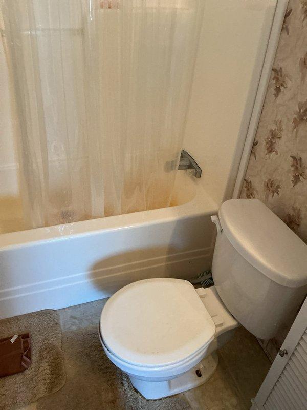 Responded to a toilet repair call at a mobile home. Upon inspection, found discolored water in the tank and outdated fill valve assembly with deteriorated components. Replaced the faulty fill valve with a new unit, including updated float mechanism and refill tube. Flushed system multiple times to clear sediment and verify proper tank filling and water shutoff. Adjusted water level to manufacturer specifications and confirmed no leaks at supply line connection. Tested flush mechanism for complete cycle operation and proper bowl refill.
