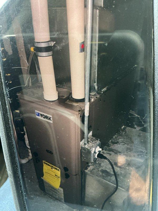 Responded to no cooling call affecting entire home. Upon arrival, inspected York HVAC system and electrical components. Found blown RK1M Ferraz Shawmut time delay fuse rated at 250V in disconnect panel. Replaced defective fuse with proper replacement, restoring power to outdoor condensing unit. Verified system operation and confirmed cooling restored to all areas of home. System returned to normal operation.