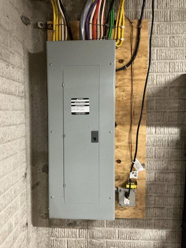 Completed installation of 24 KW residential standby generator with 200 amp automatic transfer switch. Ran approximately 40 feet of electrical conduit and wiring from the main service panel to the generator location, along with 10 feet of natural gas line to fuel supply. Installed and wired transfer switch to isolate essential circuits during utility power outages, with all connections properly terminated and secured per manufacturer specifications and local electrical code requirements.