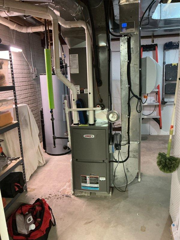 Completed scheduled MVP cooling maintenance visit on residential HVAC system. Performed comprehensive inspection of outdoor condensing unit and indoor Lennox furnace system, checking electrical connections, refrigerant levels, and airflow components. All equipment found operating within normal parameters; system tested and confirmed ready for continued cooling operation.