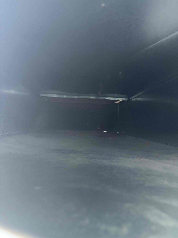 Completed indoor air quality assessment and ductwork inspection in residential crawl space. Documented significant debris accumulation within metallic flex duct system, including construction materials and particulate matter along interior surfaces. Evaluated crawl space conditions with vapor barrier in place and assessed overall HVAC system accessibility for potential air quality improvements.