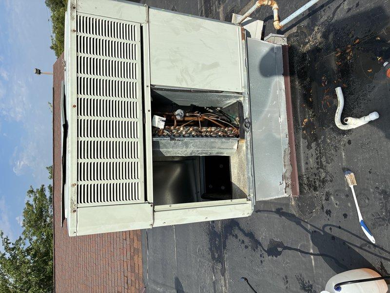 Completed MVP cooling maintenance visit on multiple HVAC systems ranging from 4 to 16 years old, including two rooftop units and two ground-level units. Performed comprehensive system inspections, accessed internal components for cleaning and evaluation, and documented equipment conditions with photographs. Initial visit completed; second appointment scheduled for full service requiring ladder access and additional technician support for rooftop unit maintenance.