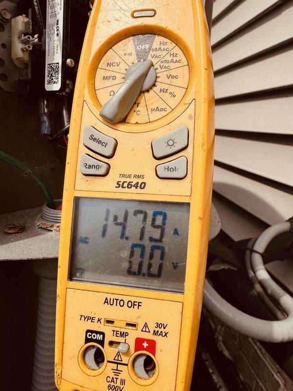 Responded to no cooling complaint on four-year-old air conditioning system affecting entire home. Performed diagnostic testing using digital multimeter, measuring voltage at 147.9V at outdoor unit. Inspected ductwork in confined space, noting significant condensation present on metal surfaces at junction points. System evaluation revealed electrical parameters and refrigerant circuit operation to determine root cause of cooling failure and restore proper system function.