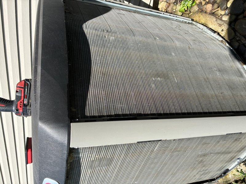 Completed MVP AC maintenance service on cooling system. Inspected and replaced air filter, which showed moderate dust accumulation but maintained structural integrity. Performed exterior inspection of condenser unit solar panels, confirming clean surfaces and proper installation with no visible damage or debris obstruction affecting system performance.