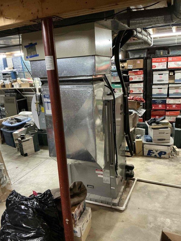 Completed geothermal system estimate for 16-year-old unit requiring ECM motor replacement. Provided quote for 2300 ECM motor installation, documented existing equipment condition with photos, and presented maintenance value plan options to customer.
