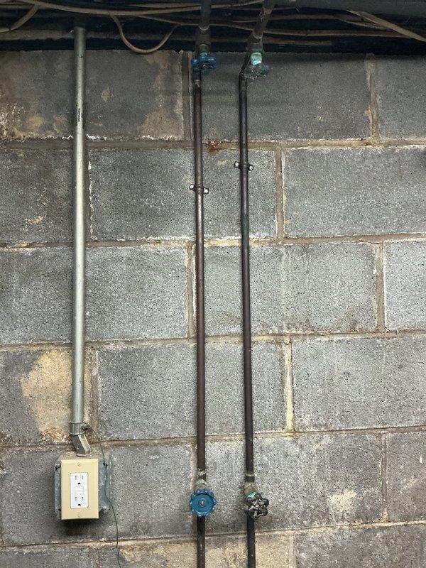 Replaced leaking washing machine supply lines in basement utility area. Repaired water supply line leading to toilet and completed new toilet installation using fixture provided by property owner. Removed existing reverse osmosis system and replaced utility tub with owner-supplied unit, reconnecting all necessary plumbing connections and ensuring proper drainage and water supply functionality.