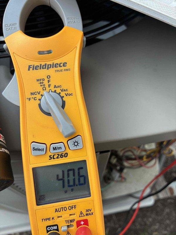 Completed MVP recurring cooling maintenance visit. Performed electrical diagnostics using clamp meter, recording 40.6 amp draw on system components. Inspected condensate drain line and noted significant discoloration and buildup inside PVC piping, indicating potential drainage concerns that may require future attention. Customer expressed interest in thermostat replacement for consideration during next service visit.