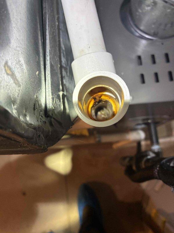 Completed MVP recurring cooling maintenance visit. Performed electrical diagnostics using clamp meter, recording 40.6 amp draw on system components. Inspected condensate drain line and noted significant discoloration and buildup inside PVC piping, indicating potential drainage concerns that may require future attention. Customer expressed interest in thermostat replacement for consideration during next service visit.