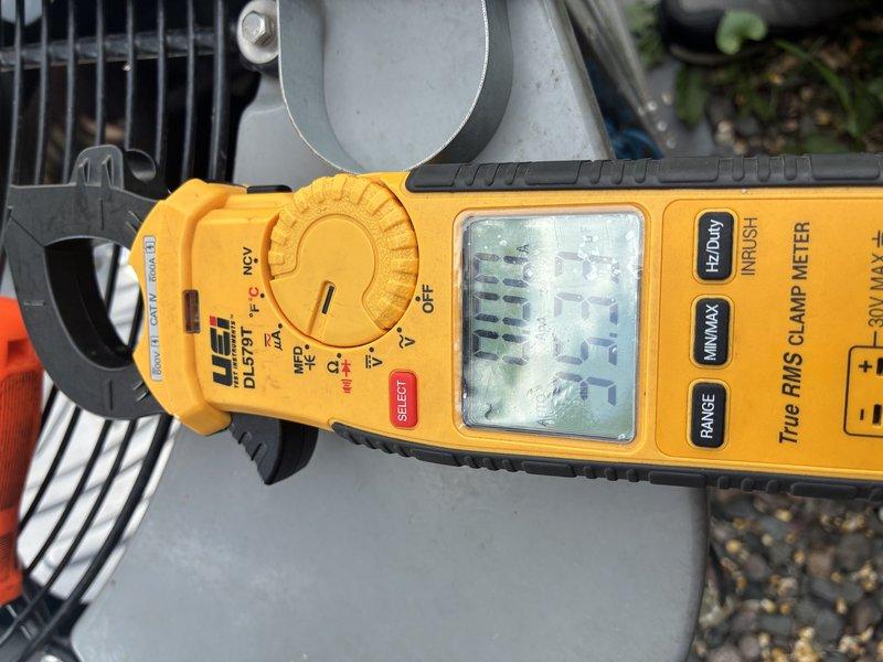 Completed MVP AC maintenance on outdoor cooling unit. Performed comprehensive system diagnostics using digital clamp meter to verify electrical readings including amperage, voltage, and capacitance. Inspected and replaced deteriorated run capacitor showing visible signs of corrosion and weathering on casing and wire terminals. Verified all electrical connections, tested system performance parameters, and confirmed unit operation within manufacturer specifications.