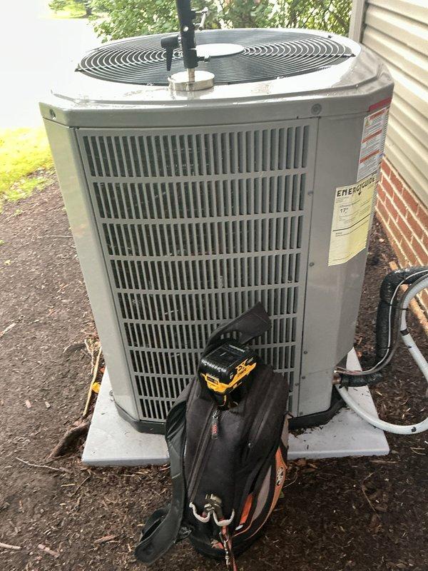 Responded to UV light service indicator alert on thermostat for recently installed Air Scrubber system. Inspected both Air Scrubber units installed in June 2025, verified proper operation of UV-C lamps, and reset service indicator. Confirmed humidifier and overall HVAC system functioning properly with 9-year-old air conditioning unit showing normal operating conditions.
