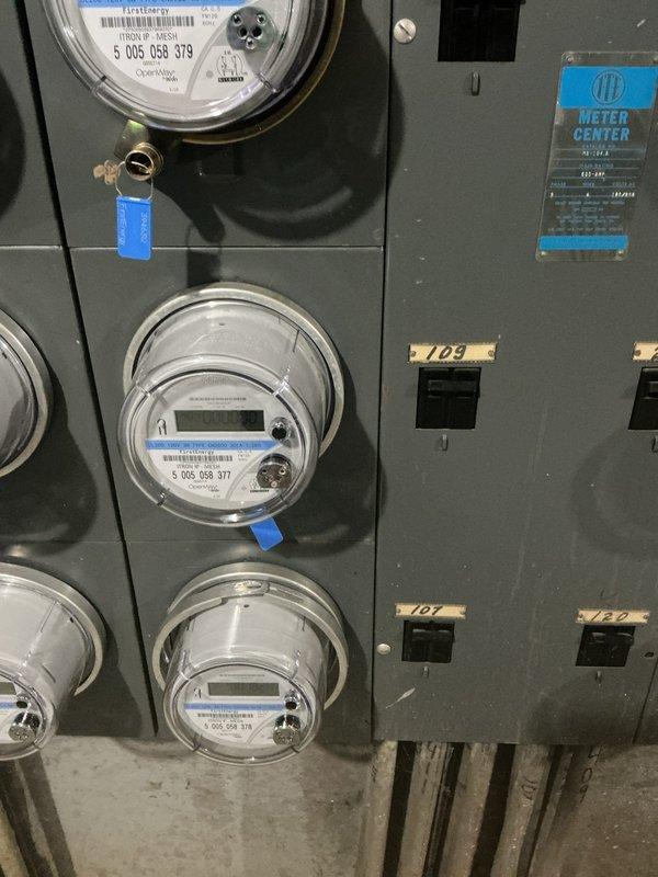 Completed comprehensive electrical inspection of vacant property as requested by power company. Inspected main electrical panel, meter center with multiple utility meters, and verified all electrical systems were properly installed and functioning. All components found to be in normal working condition with utility seals intact and ready for service activation.