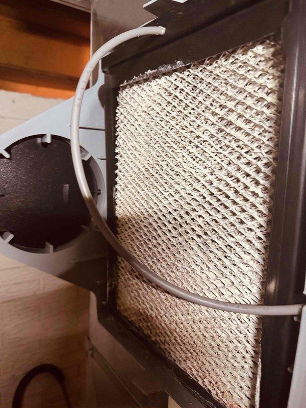 Diagnosed E1 error code on evaporative cooler system and determined humidity sensor failure in humidistat was causing malfunction and inaccurate readings. Replaced defective humidistat with new unit using inventory from service vehicle. System tested and restored to proper operation with humidity sensor now reading correctly and error code resolved.