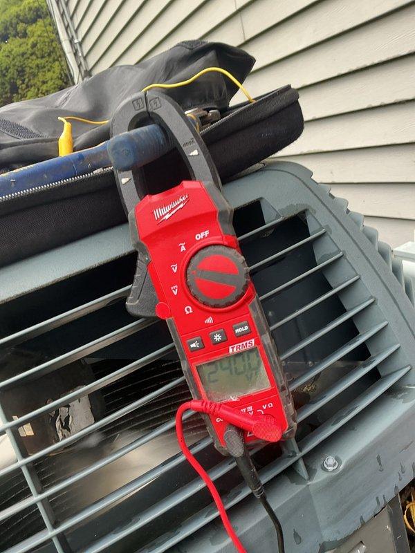 Completed comprehensive cooling system maintenance on residential air conditioning unit estimated at approximately 2 years old. Performed standard AC tune-up procedures including temperature diagnostics at the air handler test port (measured 45°F supply air temperature) and electrical testing at the outdoor condenser unit using digital multimeter to verify proper voltage and amperage. System operating within normal parameters with no deficiencies identified or repairs required.