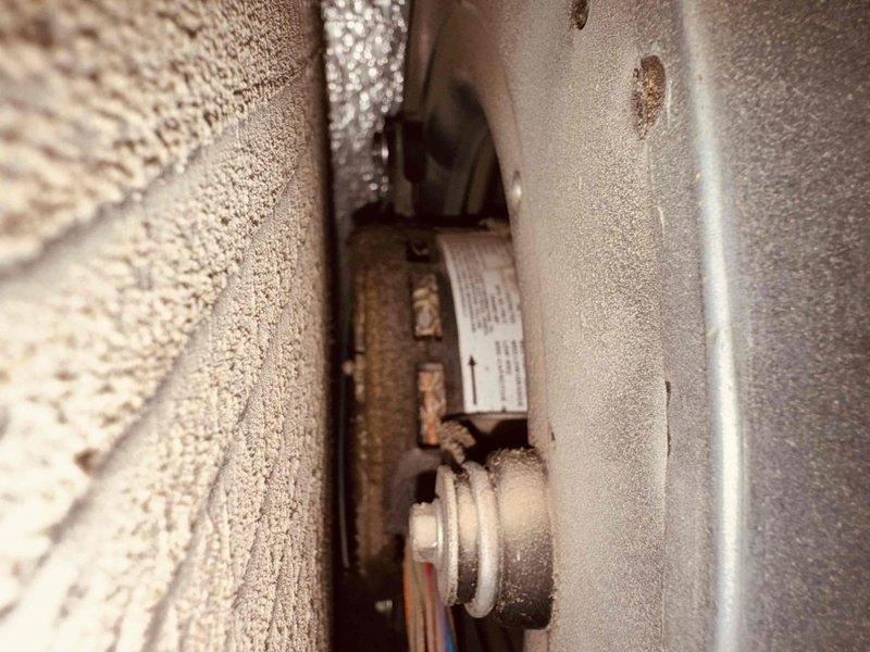 Provided second opinion evaluation on air conditioning system experiencing short cycling issues. Upon inspection, assessed compressor and associated components, documenting existing conditions with photographic evidence. Examined mechanical components, refrigerant lines, and mounting hardware, noting visible corrosion on metal fittings and general wear on system components. Evaluated compressor operation and cycling patterns to determine root cause of malfunction and provided professional assessment of repair versus replacement options.