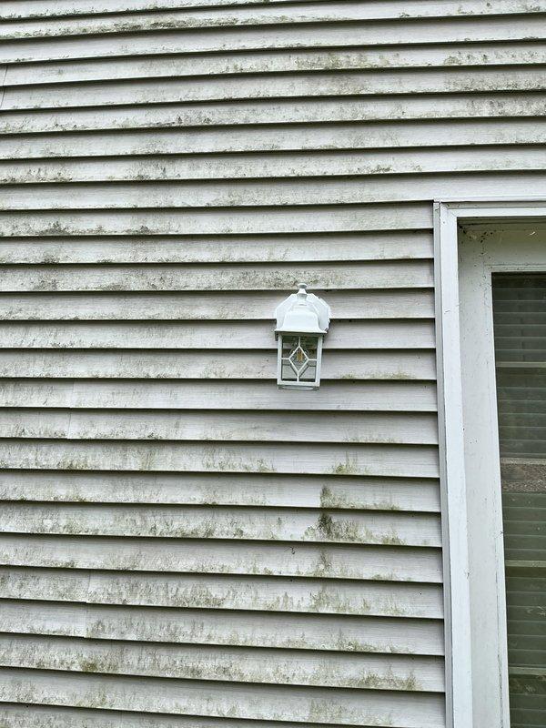 Performed site evaluation for replacement of nine exterior light fixtures. Identified four garage-mounted fixtures lacking proper electrical boxes and front-mounted fixtures with protruding pan boxes incompatible with flush installation of new fixtures. Recommended and will install nine Arlington siding blocks to ensure proper mounting and flush appearance. Will replace all nine customer-supplied lantern-style fixtures with appropriate electrical boxes where missing, removing existing siding blocks and installing new weatherproof mounting solutions for code-compliant, aesthetically consistent installation across all exterior locations.