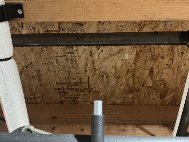 Responded to service call for leaking 6-year-old tanked water heater with water seepage from bottom of unit. Performed on-site assessment of existing water heater installation and documented current conditions with photos. Inspected water heater location, venting system, gas connections, and surrounding plumbing infrastructure in unfinished basement area. Evaluated existing ductwork, copper supply lines, and structural mounting configuration. Provided quote for complete water heater replacement with new tanked unit and discussed alternative tankless water heater options per customer interest.