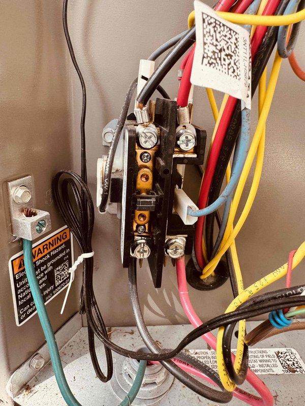 Completed MVP recurring cooling maintenance visit. Inspected electrical control panel wiring and connections, verified proper termination of multi-conductor wiring at terminal block, and confirmed all safety labeling present. Performed electrical diagnostics using digital multimeter, measuring current draw of 0.65 amps and verifying voltage readings to ensure system operating within normal parameters.