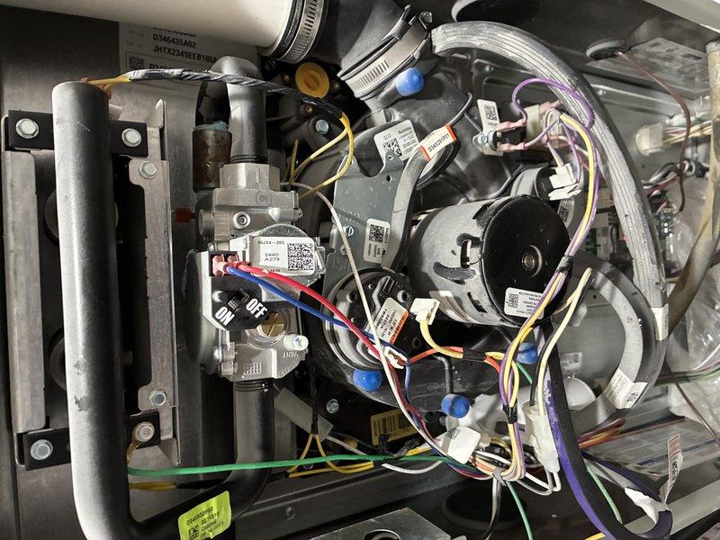 Performed comprehensive furnace inspection on 2-year-old unit per customer request. Accessed internal components and conducted thorough visual examination of all major systems including heat exchanger, gas valve assembly, blower motor, and electrical connections. Inspected heat exchanger tubes for cracks or deterioration, verified gas valve operation and connections, examined all wiring harnesses and terminations for proper connection and signs of overheating. Checked blower motor assembly and mounting hardware for secure installation. Verified proper condensate drainage through PVC piping and inspected all ductwork connections. All components found to be in good operating condition with no immediate repairs required. Unit operating within normal parameters for age and usage.