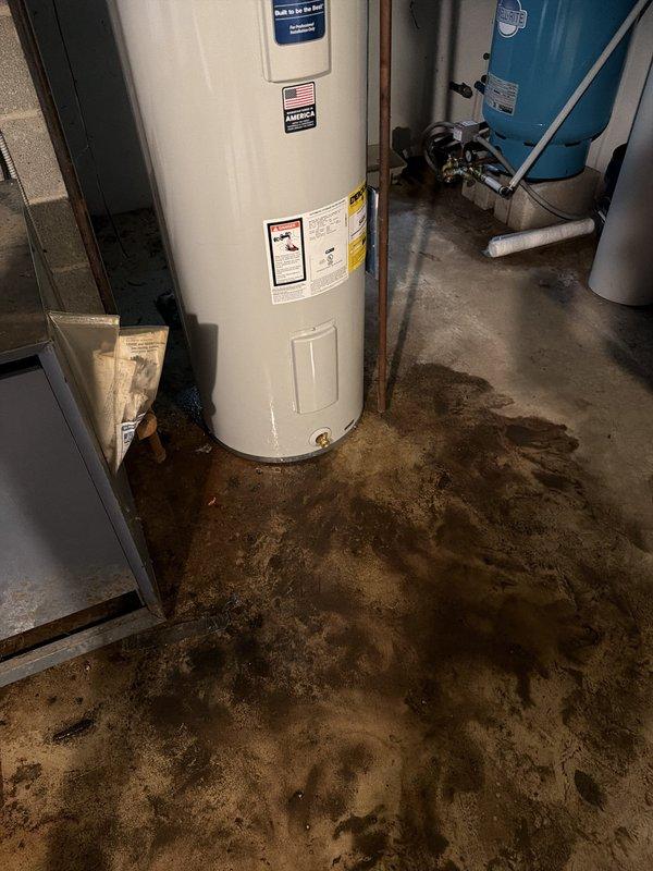 Installed a new 50-gallon electric water heater with 8-year warranty in basement utility room. Removed and disposed of existing failed unit, then installed replacement tank with proper copper piping connections, pressure relief valve, and drain valve. Mounted and connected thermal expansion tank to system per code requirements to protect against thermal expansion damage. Staged all components from complete water heater installation kit, verified all connections for leaks, and tested unit operation. System is fully functional and operational.