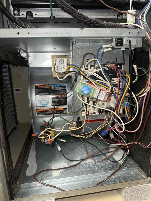Completed scheduled MVP heating maintenance visit on 10-year-old system. Performed comprehensive inspection of furnace components, including visual examination of control board, electrical connections, and safety systems. All wiring connections were verified secure with no signs of overheating or deterioration. Inspected blower assembly and noted moderate to heavy dust accumulation on blower wheel blades affecting airflow efficiency. Documented system condition through photographic records showing interior components and blower wheel condition for maintenance tracking purposes. System operational at time of inspection.