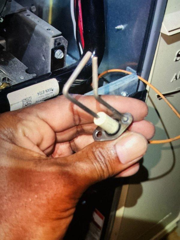 Completed scheduled BS-MVP cooling maintenance visit on 4-year-old air conditioning system and 4-year-old heating system. Performed comprehensive inspection of both units, including electrical connections, refrigerant levels, and operational components. Replaced faulty igniter assembly on heating unit as shown in documentation photos, ensuring proper installation and testing of the new component with thermal sensor verification.