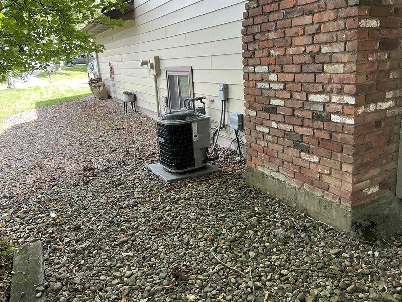 Completed electrical estimate for whole-home standby generator installation at residential property with natural gas service. Evaluated existing 100-amp Square D electrical panel and HVAC equipment placement to determine optimal generator location, transfer switch requirements, and electrical service capacity for automatic backup power system.
