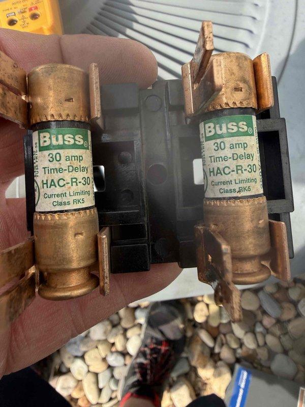 Completed MVP cooling maintenance visit on residential Lennox HVAC system. Inspected and photographed electrical components, including 30-amp time-delay fuses showing signs of oxidation on copper end caps, which were documented for monitoring. Verified proper operation of furnace unit, ductwork connections, refrigerant lines, and condensate drainage system with all components functioning within normal parameters.