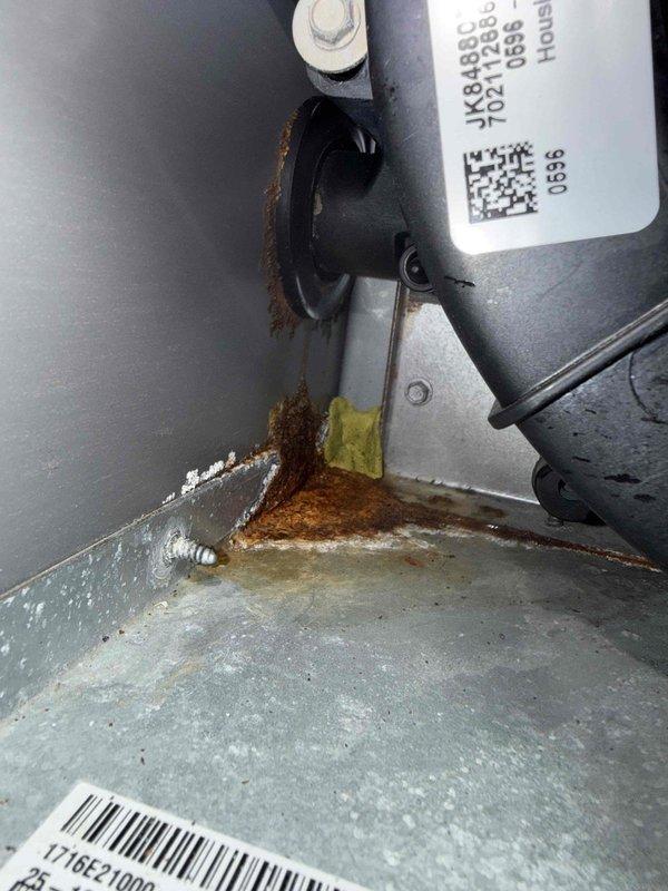 Completed MVP air conditioning maintenance on a 10-year-old Lennox cooling system. Performed comprehensive inspection of outdoor condensing unit, confirmed proper operation of all components, and documented equipment condition including notable rust and corrosion present at the evaporator coil drain pan junction requiring future monitoring.
