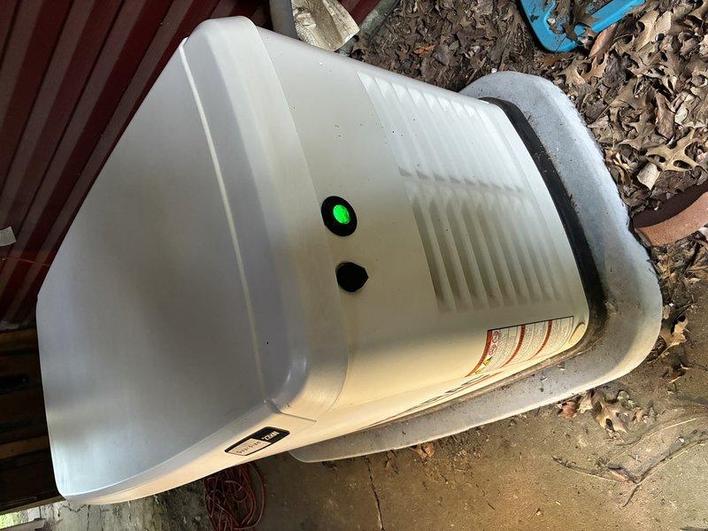 Performed first-time preventive maintenance on Generac standby generator unit. Completed visual inspection of generator enclosure, verified proper operation of control panel indicator lights, and documented equipment condition with photographs. Unit found to be in functional condition with normal outdoor weathering; no immediate repairs required.