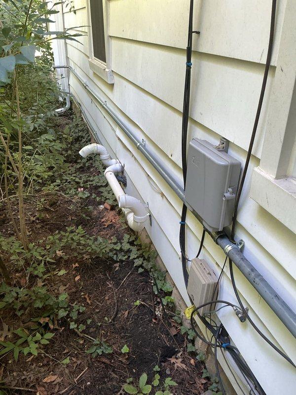 Responded to failed electrical inspection by installing required bracing and straps on electrical lines running to and from the meter and generator. All conduit lines were properly secured with straps at 8-foot intervals per code requirements. Photographic documentation of completed bracing work was captured and provided to the inspection authority for approval verification.