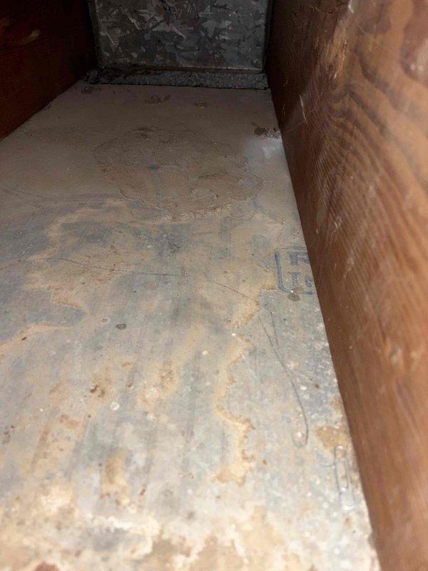 Completed comprehensive duct cleaning service in attic space, removing accumulated dust, debris, and particulate matter from HVAC ductwork and surrounding structural areas. Before-service photos documented heavy dust accumulation on wooden joists, beams, and horizontal surfaces, along with visible debris on attic flooring near ductwork components. Successfully cleaned all accessible duct sections and improved overall indoor air quality by eliminating contaminants from the ventilation system.