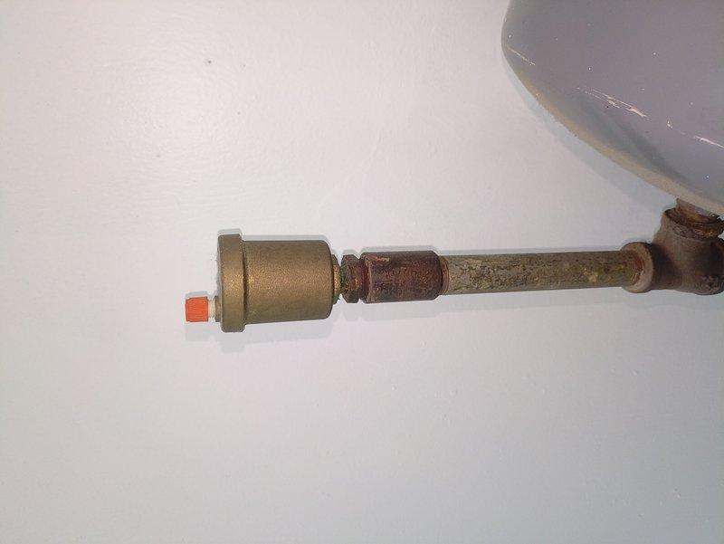 Responded to service call for dripping pressure relief valve on Navien boiler system. Upon inspection, found extensive corrosion and deterioration on pressure relief valve assembly and associated piping. The valve showed significant rust buildup and age-related wear, indicating prolonged exposure to moisture and potential system overpressurization issues. Documented current condition with photographs showing the corroded valve body, fittings, and connections. Advised customer that the pressure relief valve requires immediate replacement due to safety concerns, as the corrosion has compromised the integrity of the valve assembly and could lead to system failure or safety hazards if not addressed promptly.